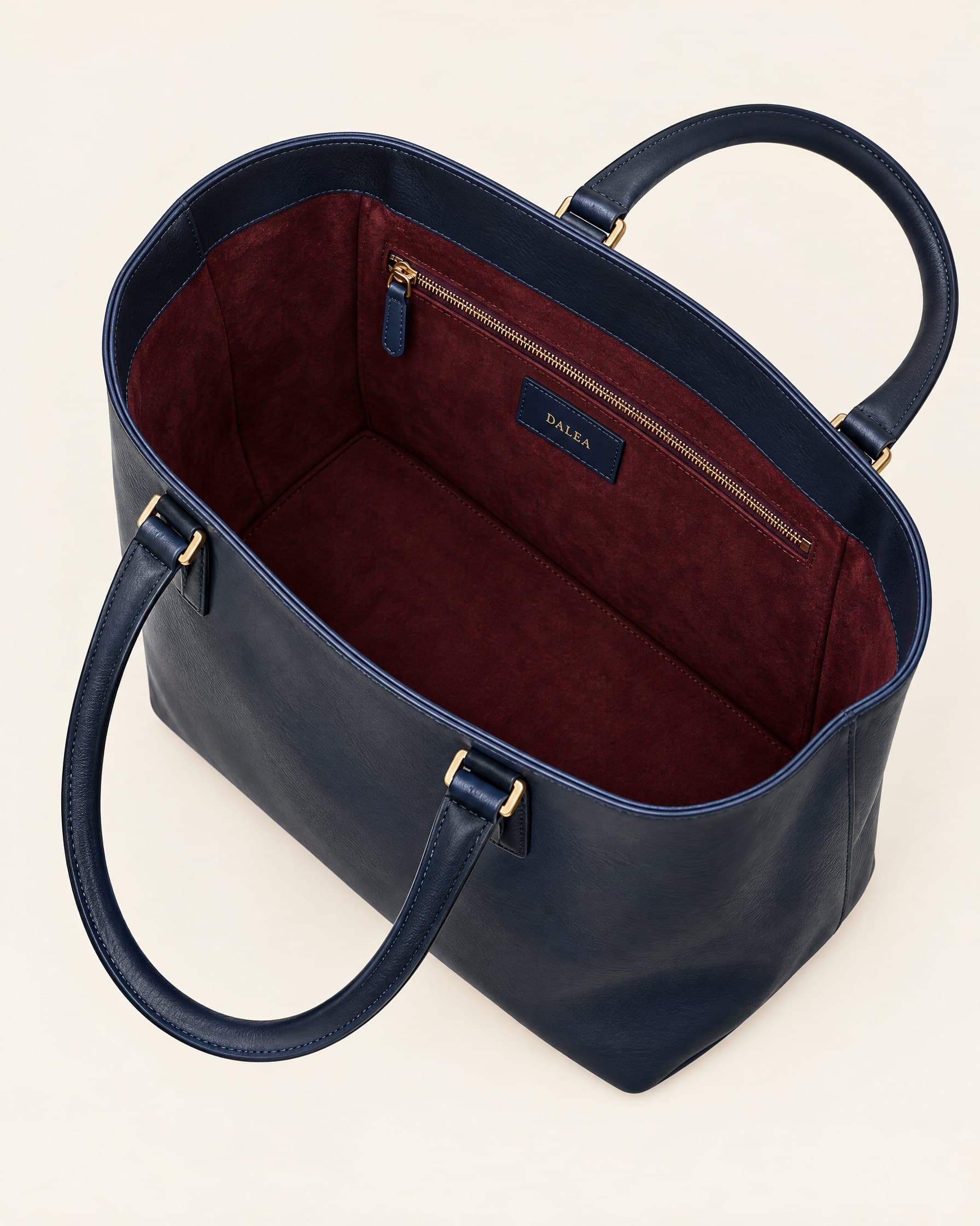 Bordeaux suede interior with zip pocket